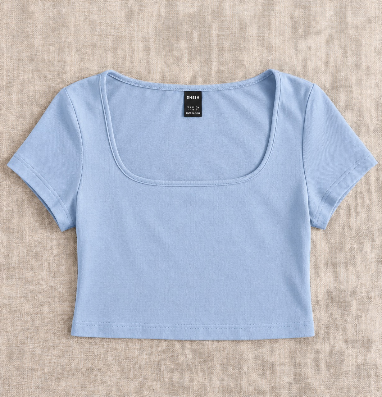 Blusa celeste corta
