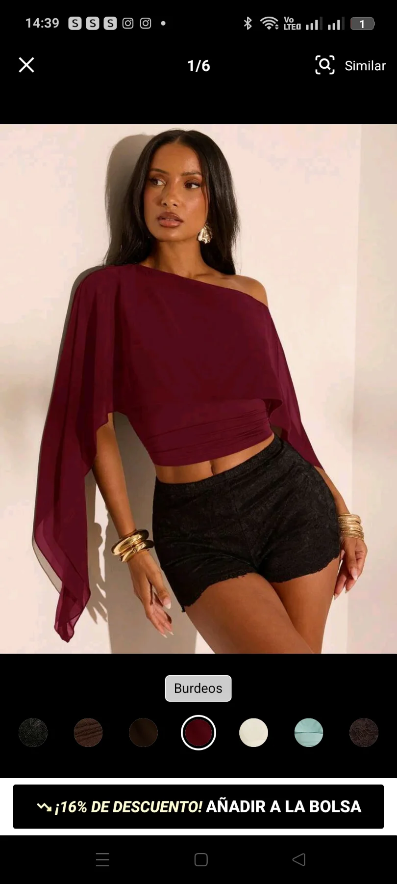 Blusa capa elegante